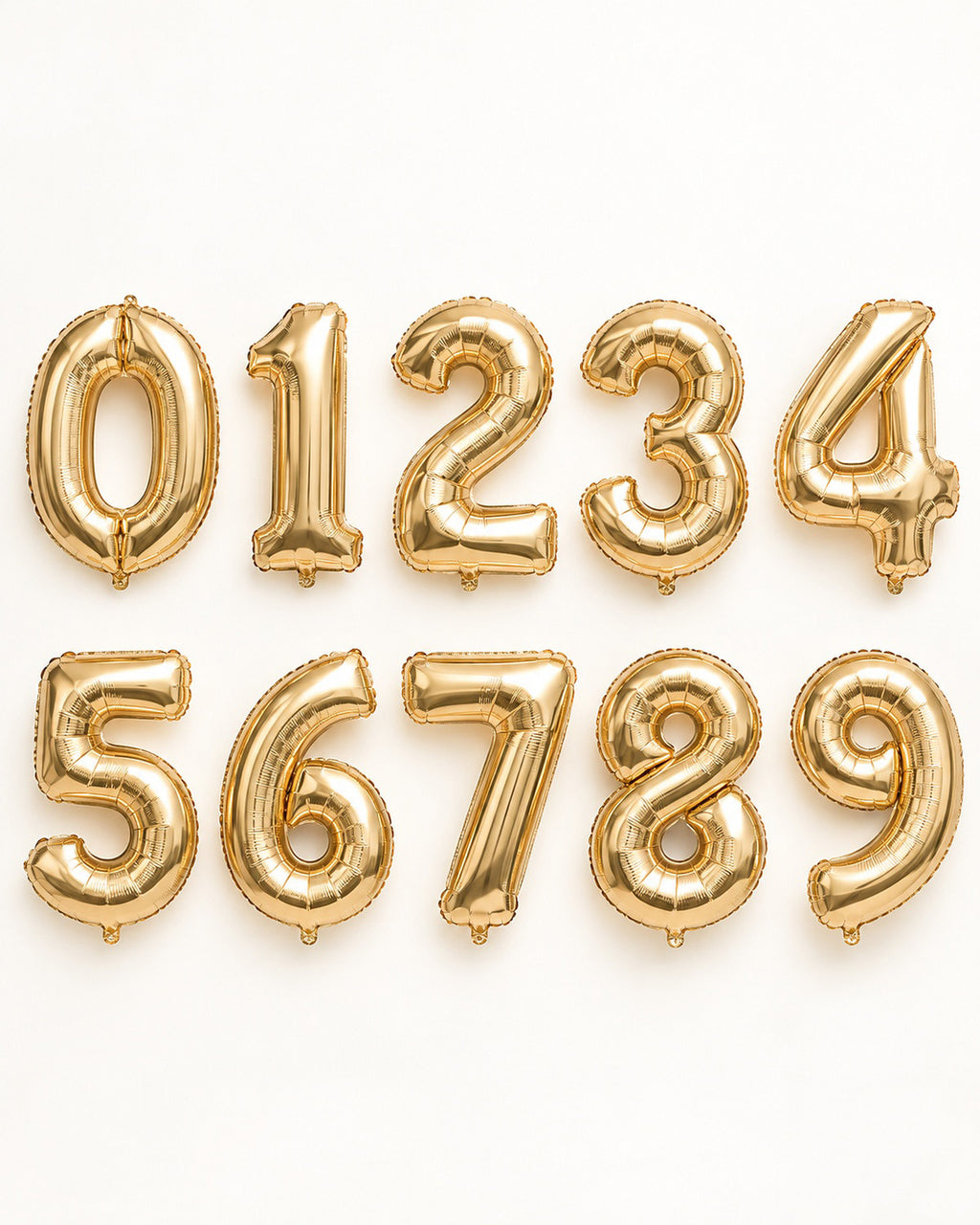 Champagne-gold foil number balloons from 0 to 9, arranged in two rows