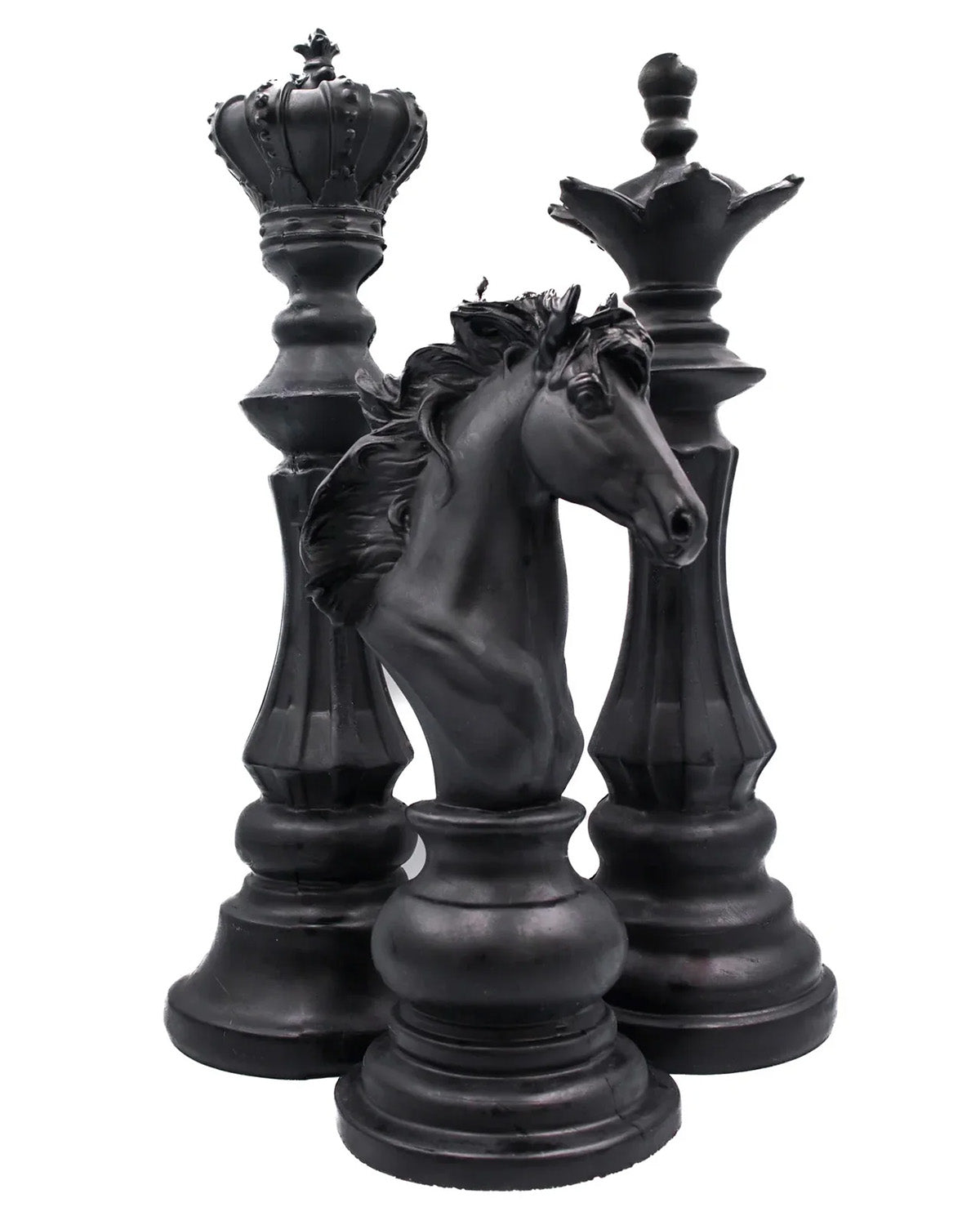 King, queen, and knight chess-piece candles