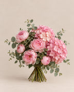 Pink Cloud bouquet with pink peonies, hydrangea, and eucalyptus