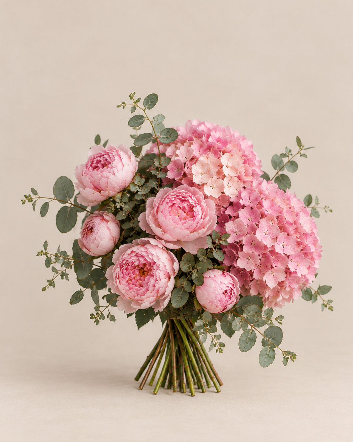 Pink Cloud bouquet with pink peonies, hydrangea, and eucalyptus